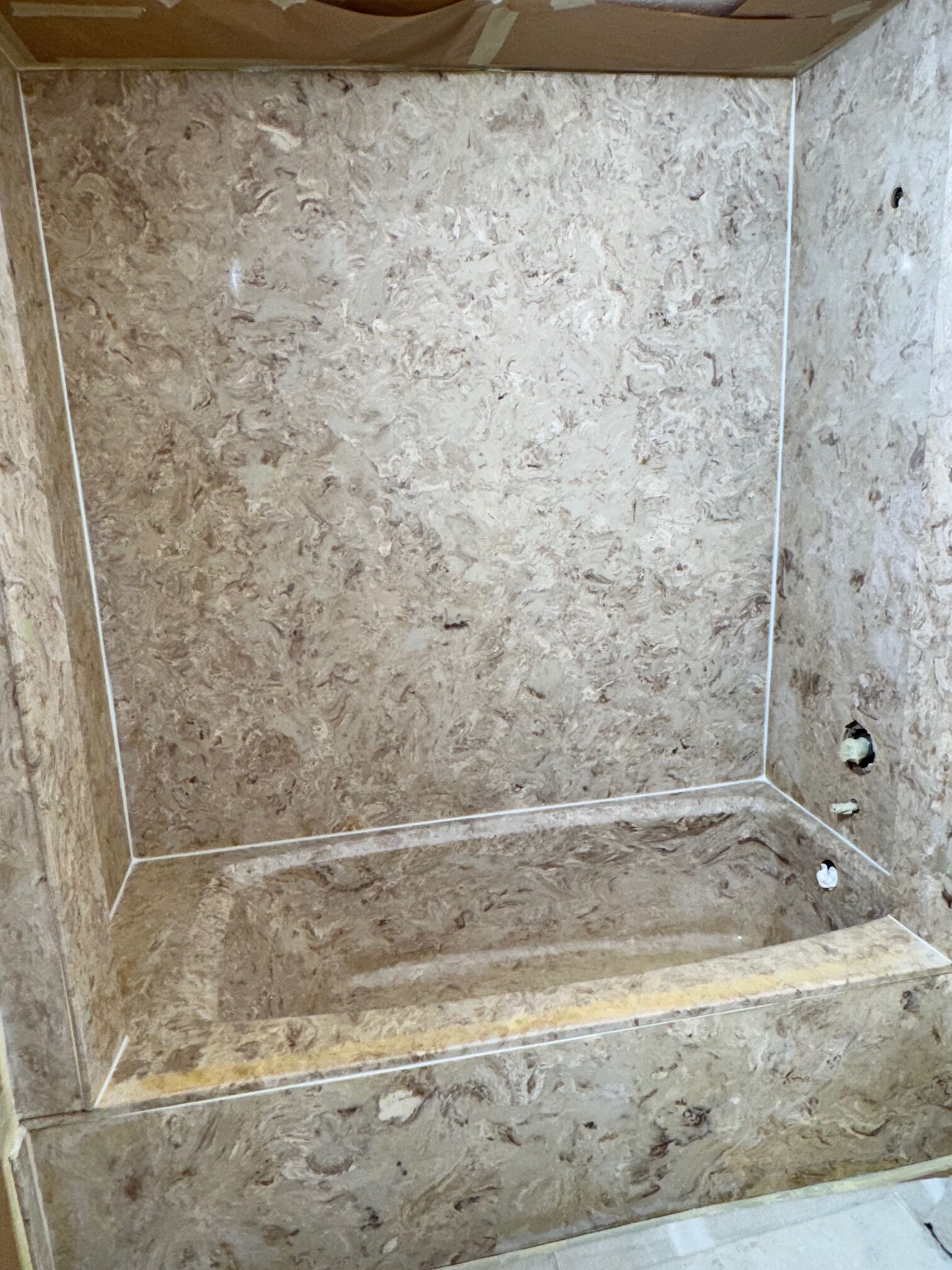 Picture of a shower that is getting refinished