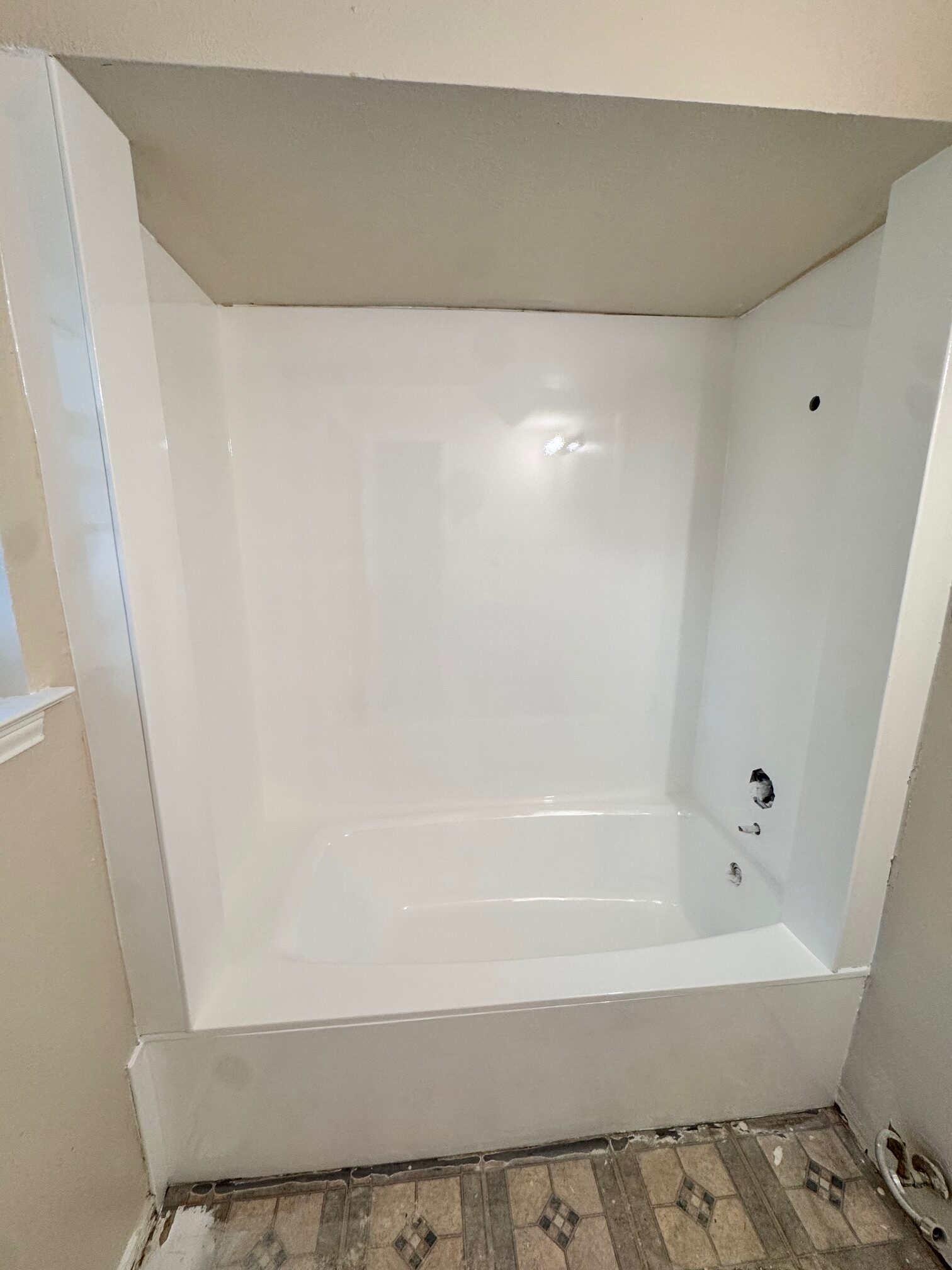 Image of a shower that has been refinished.